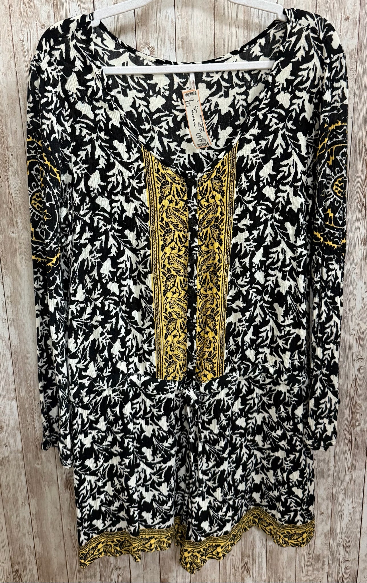 Size M FREE PEOPLE BLACK AND BEIGE Romper