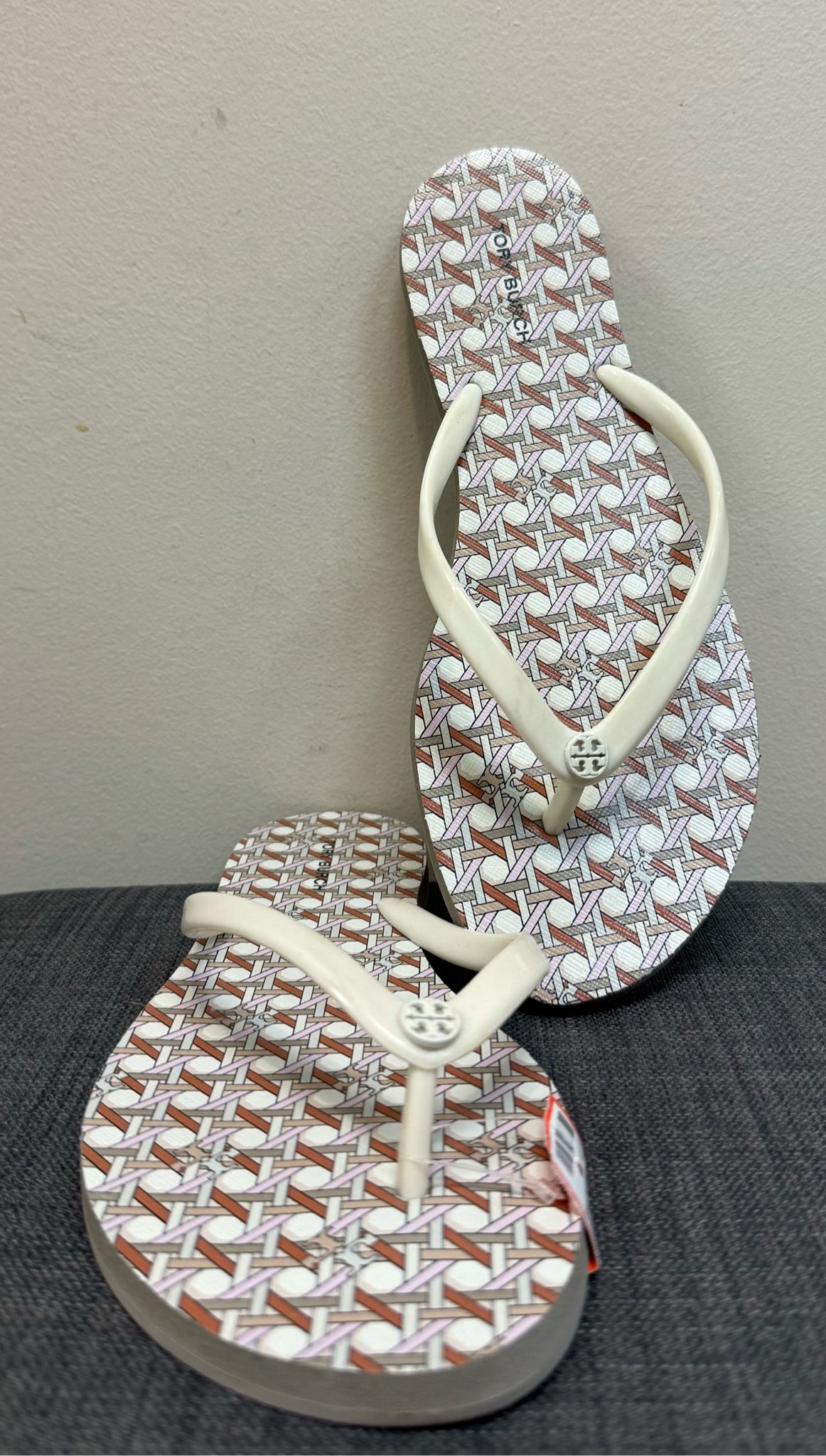 9 TORY BURCH CREAM AND ORANGE FLIP FLOP