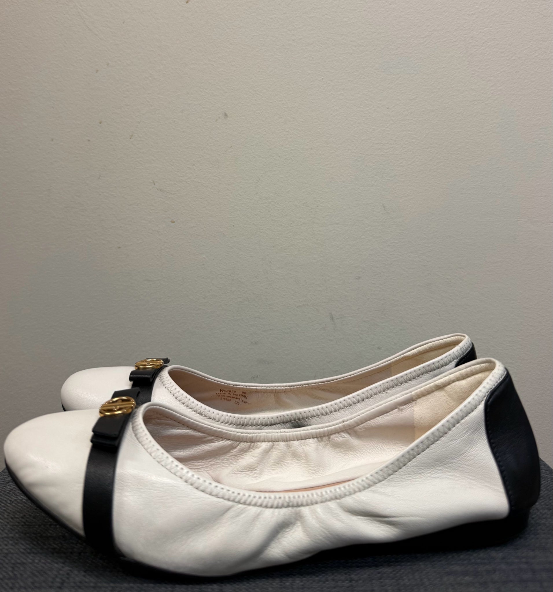9 COLE HAAN IVORY AND BLACK SHOES