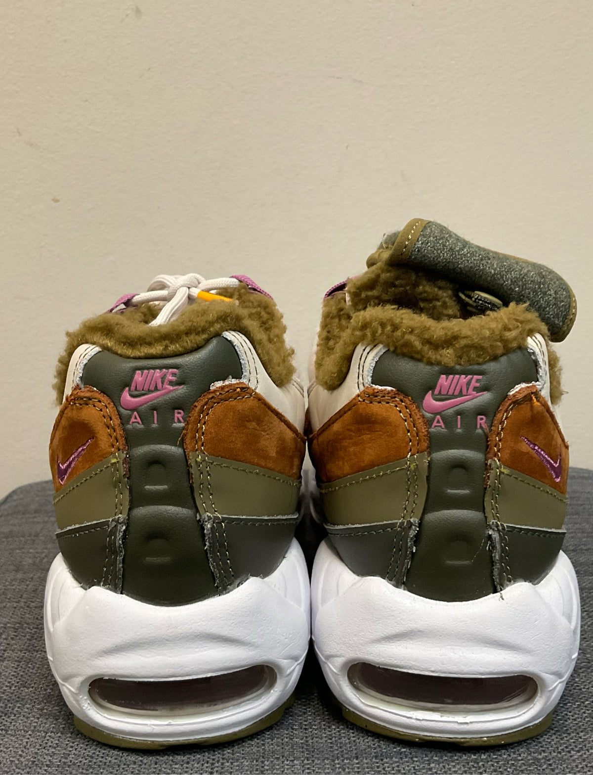 7 NIKE OLIVE AND WHITE SHOES