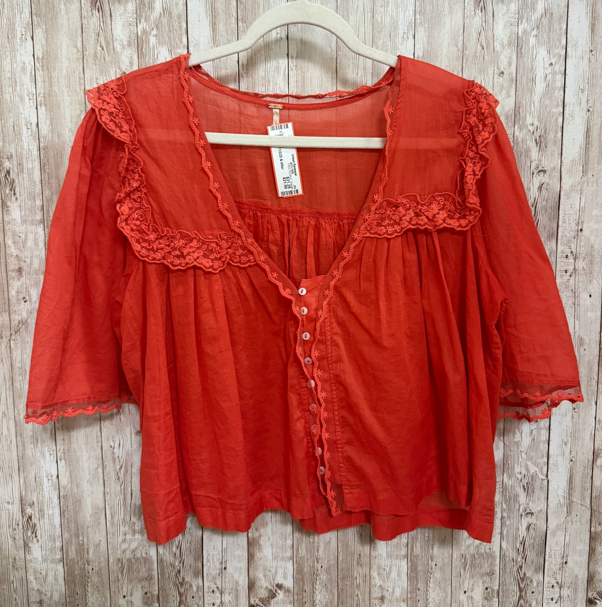 Size M FREE PEOPLE Orange Top