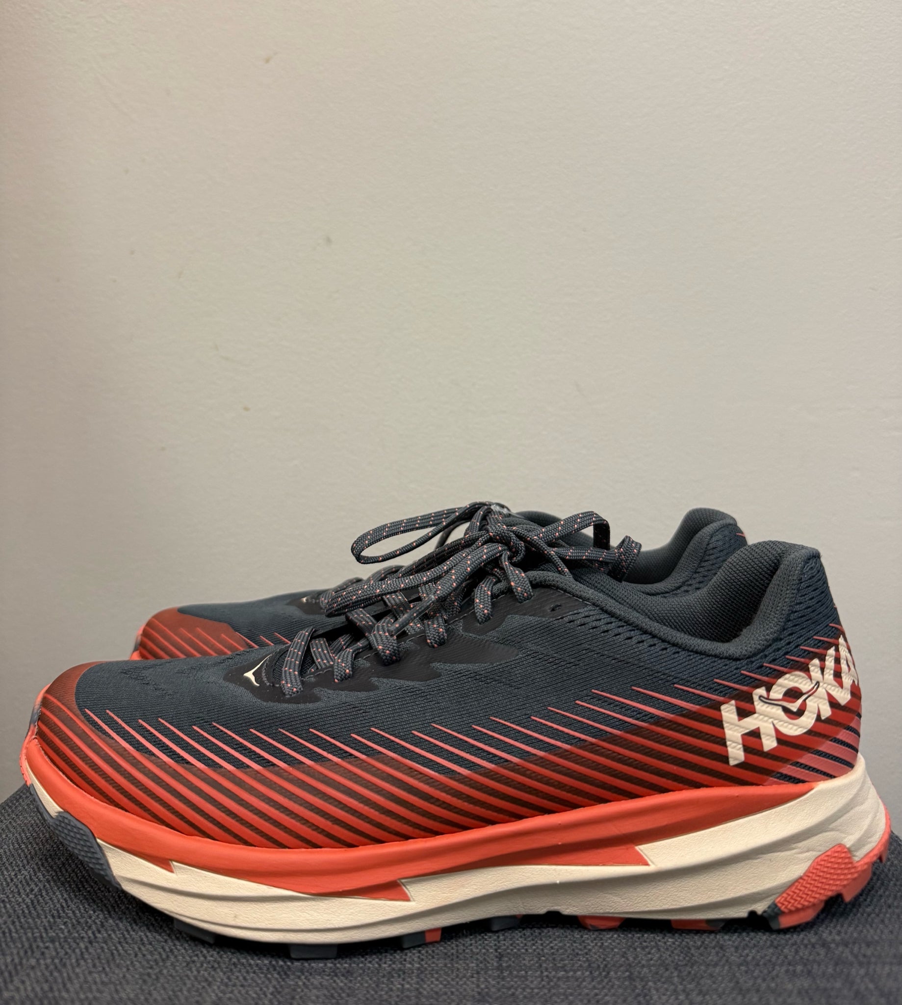 9 HOKA GREY AND ORANGE SHOES