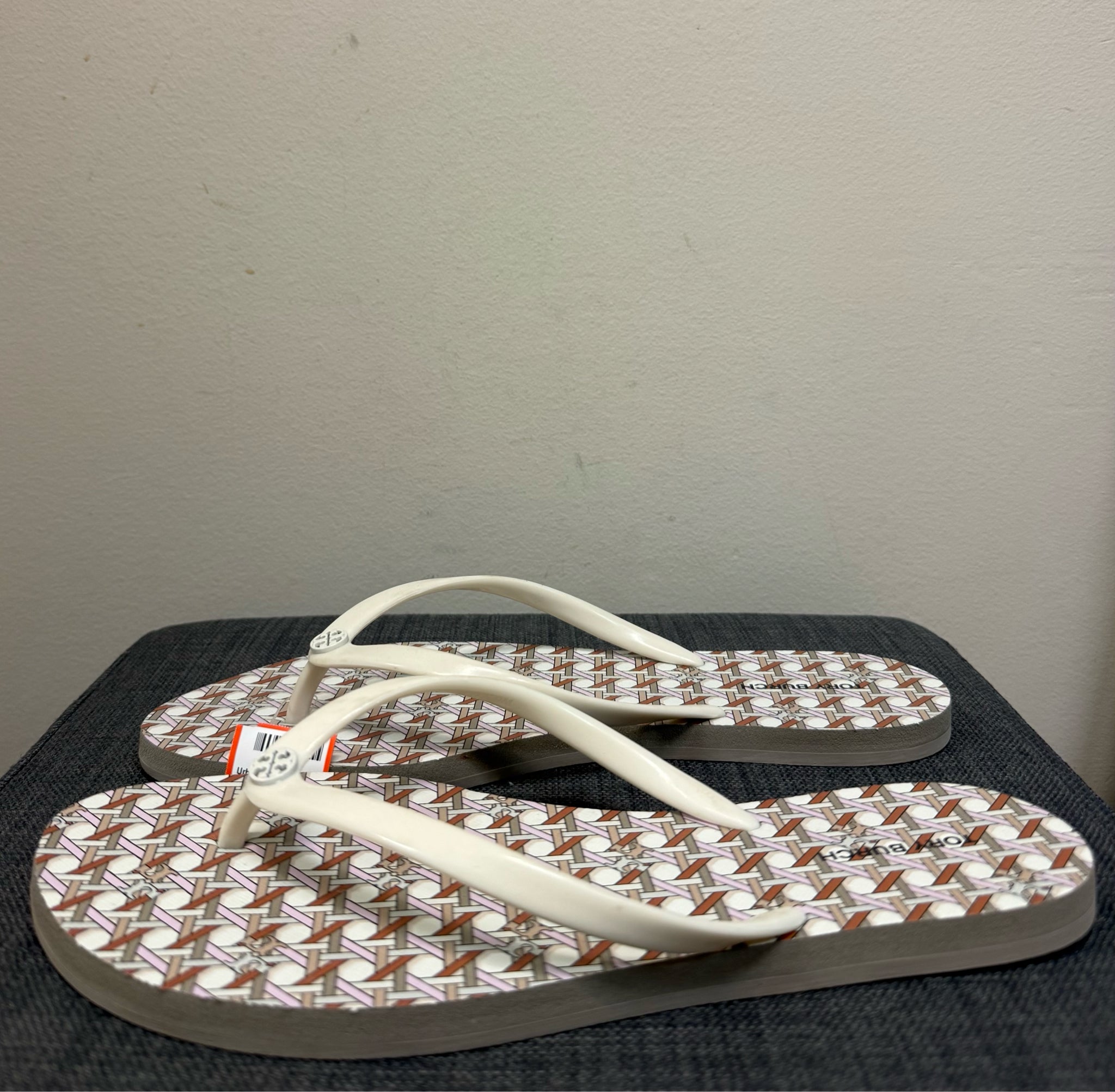 9 TORY BURCH CREAM AND ORANGE FLIP FLOP